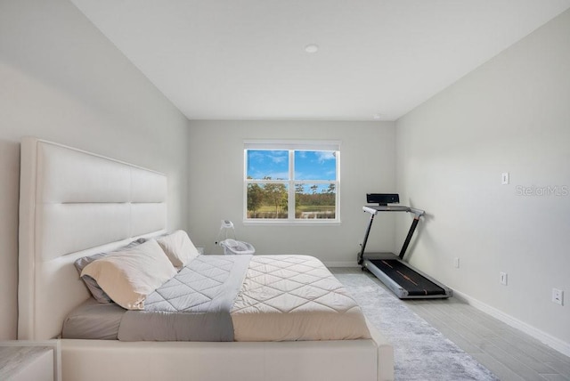 bedroom with light hardwood / wood-style floors