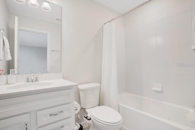 full bathroom featuring shower / bath combination with curtain, vanity, and toilet