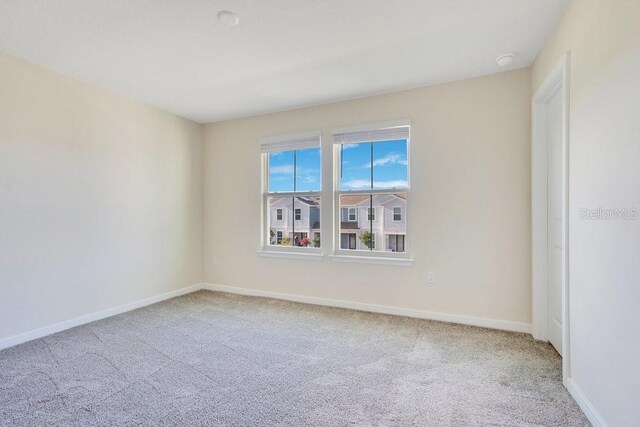 view of carpeted spare room