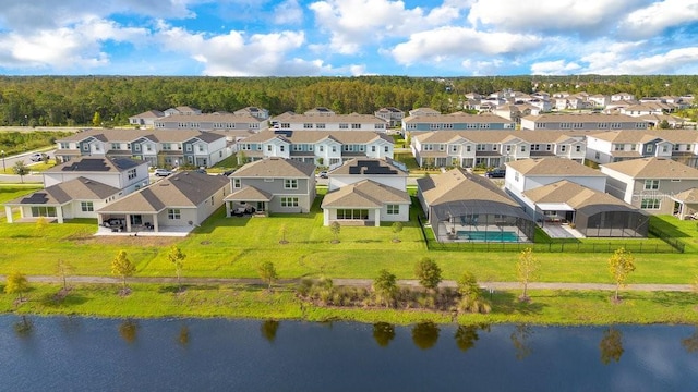 drone / aerial view with a water view