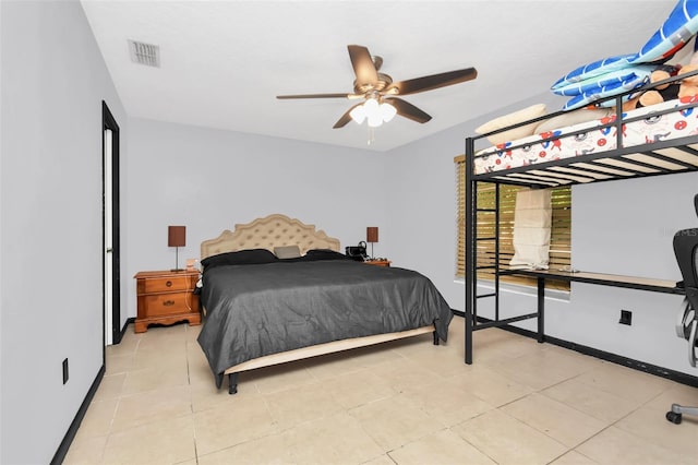 bedroom with light tile patterned flooring and ceiling fan