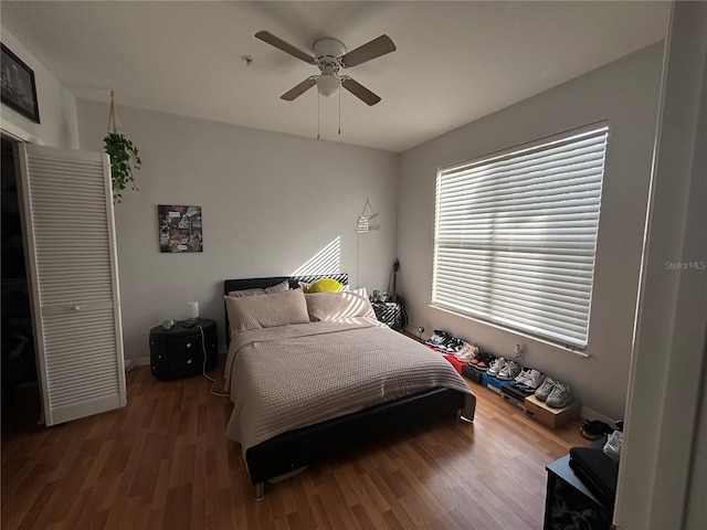 bedroom featuring ceiling fan and hardwood / wood-style flooring