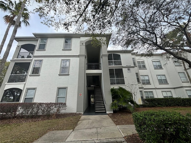 view of building exterior with stairs