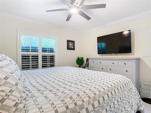 bedroom featuring crown molding and ceiling fan