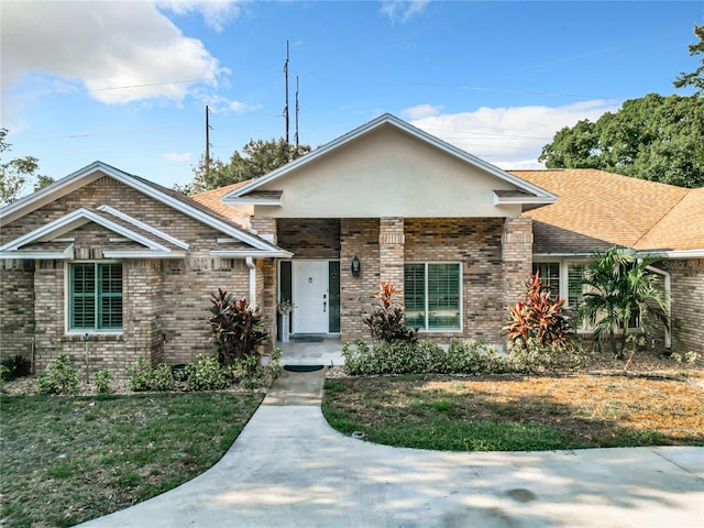 view of front of home with a front lawn