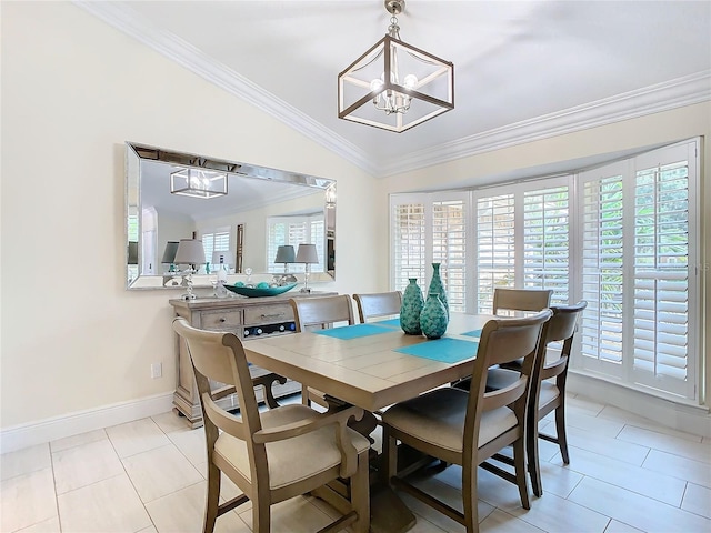 dining room with ornamental molding, a chandelier, vaulted ceiling, and light tile patterned flooring