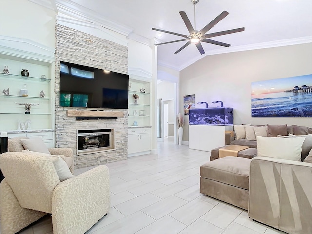 living room featuring crown molding, vaulted ceiling, a fireplace, and built in features