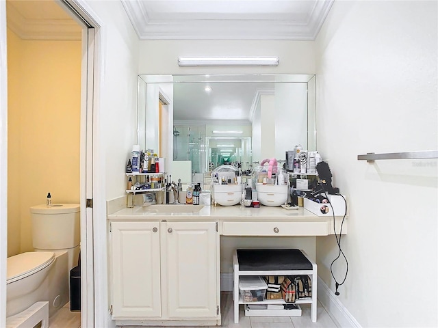 bathroom featuring vanity, ornamental molding, toilet, and an enclosed shower