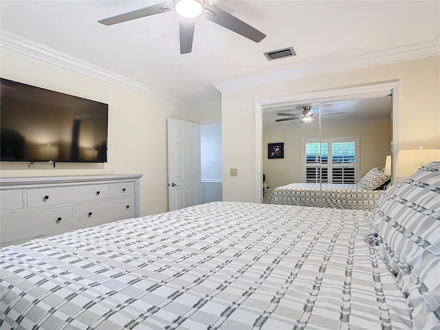 bedroom featuring crown molding and ceiling fan