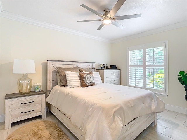 bedroom featuring ceiling fan and crown molding