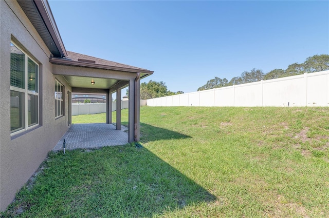 view of yard with a patio area