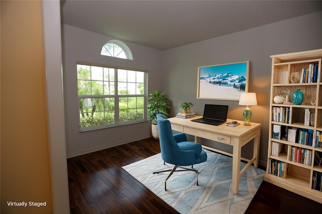 home office with dark hardwood / wood-style floors