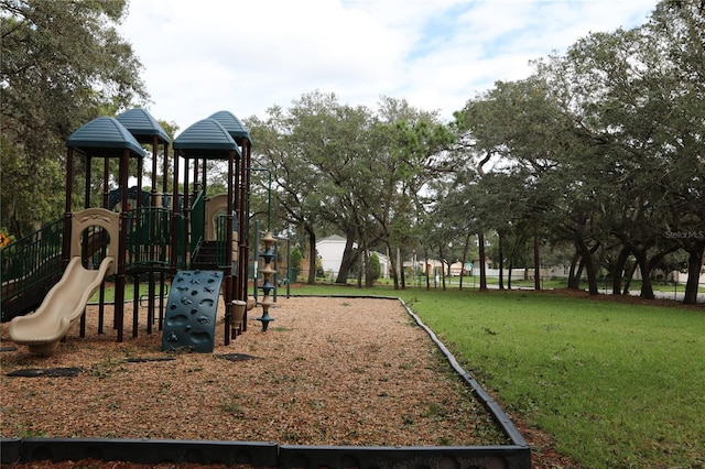 view of playground featuring a yard