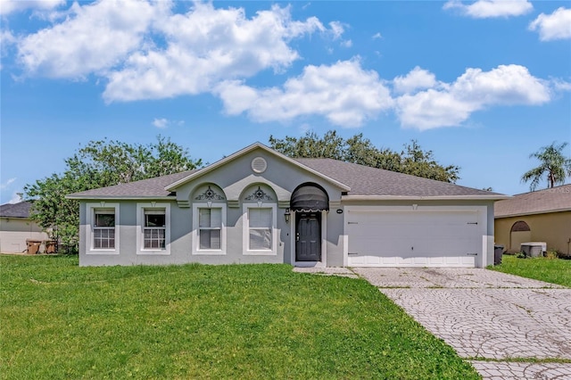 ranch-style house with a garage and a front yard