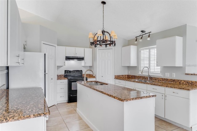 kitchen featuring black range with electric cooktop, white cabinetry, sink, and a kitchen island with sink