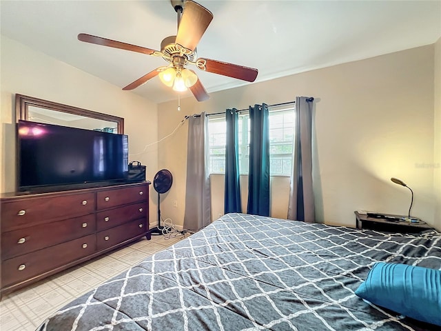 bedroom featuring ceiling fan