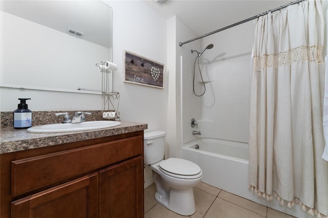 full bathroom with tile patterned flooring, vanity, shower / tub combo with curtain, and toilet