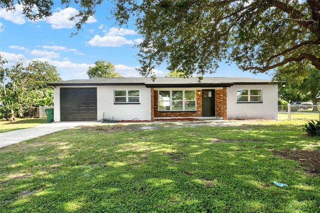 1004 Jersey St, Cocoa, FL 32927 - ranch-style house featuring concrete block siding, a garage, and concrete driveway