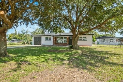 1004 Jersey St, Cocoa, FL 32927 - single story home featuring a front yard and a garage