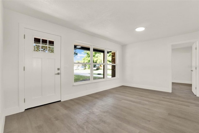 1004 Jersey St, Cocoa, FL 32927 - foyer featuring baseboards and wood finished floors