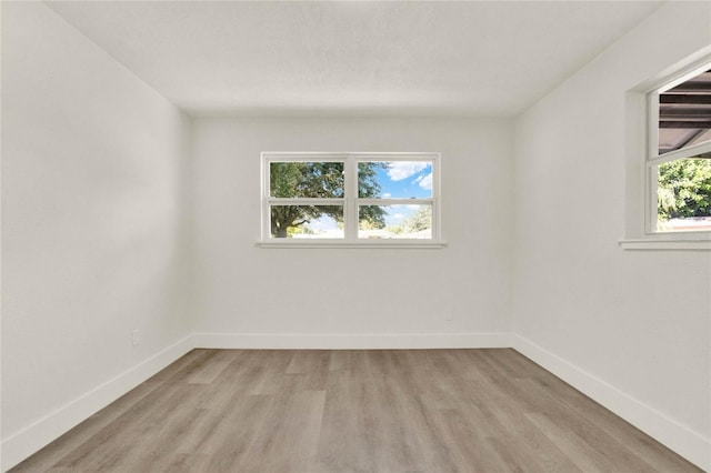 1004 Jersey St, Cocoa, FL 32927 - unfurnished room featuring light wood finished floors and baseboards