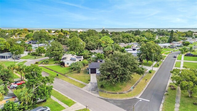 1004 Jersey St, Cocoa, FL 32927 - aerial perspective of suburban area with a tree filled landscape
