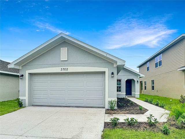 single story home with a garage