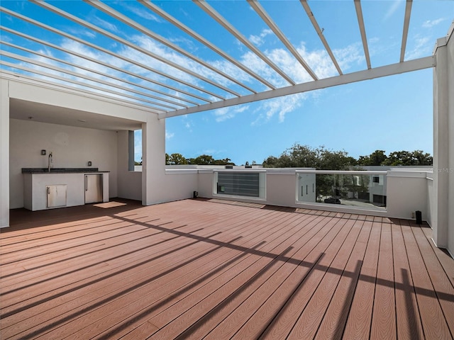 wooden deck with a pergola