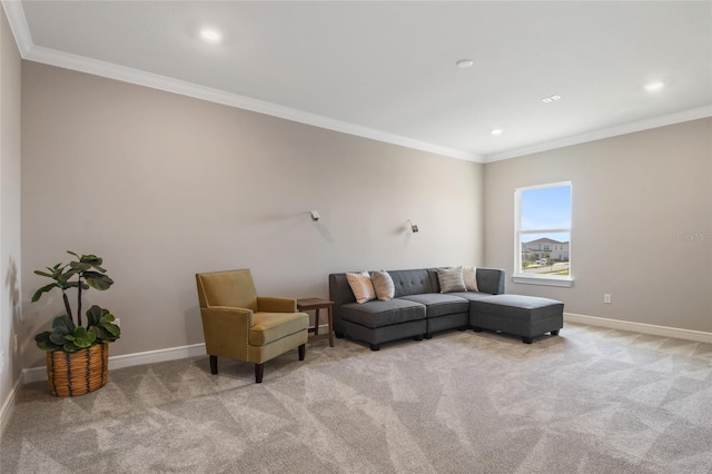 living room with ornamental molding and light carpet