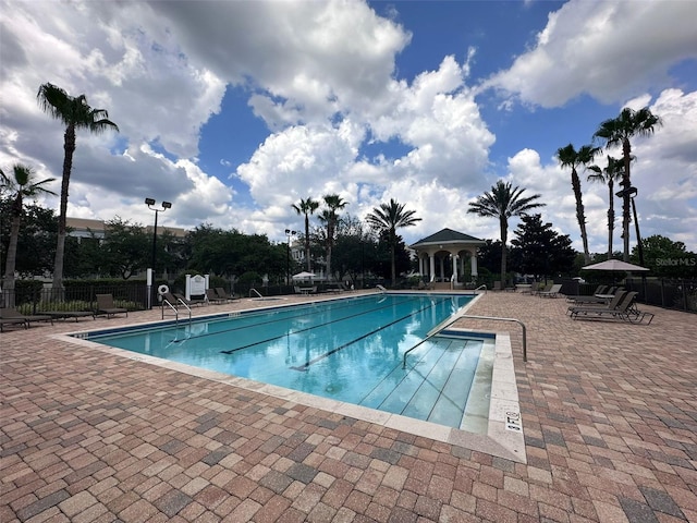 view of pool featuring a patio