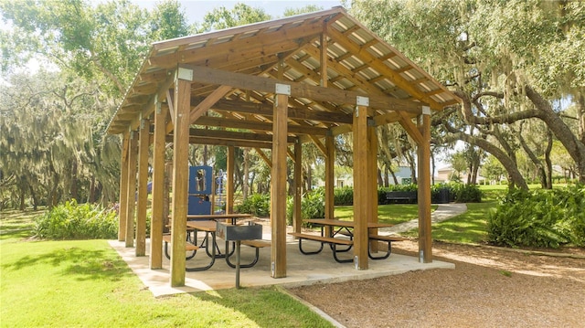 view of home's community with a gazebo and a yard