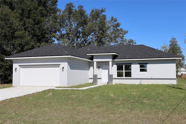 ranch-style home with a front yard and a garage