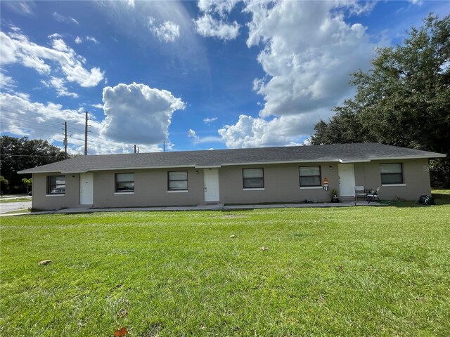 single story home with a front yard