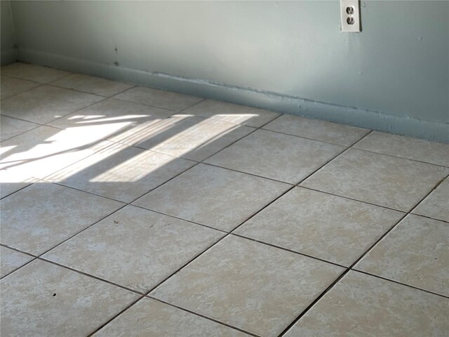 details with tile patterned flooring