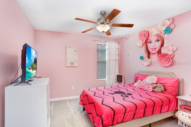 bedroom with ceiling fan and light colored carpet