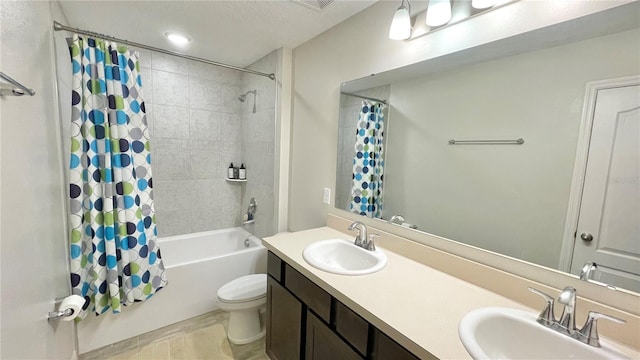 full bathroom with vanity, toilet, and shower / bath combo