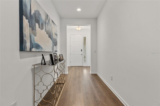 890 Terrapin Dr, Debary, FL 32713 - hall featuring baseboards, recessed lighting, and wood finished floors