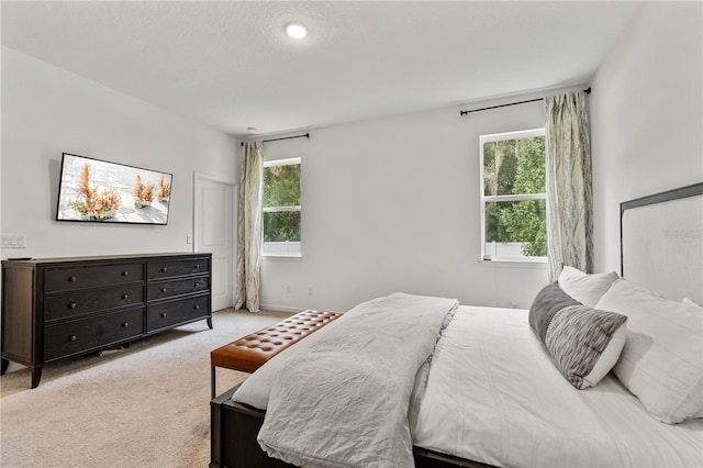 890 Terrapin Dr, Debary, FL 32713 - bedroom with light carpet and multiple windows