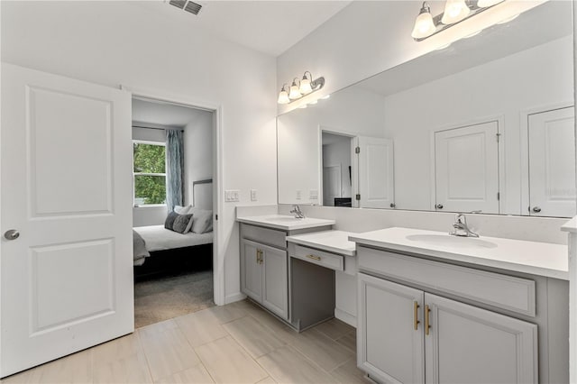 890 Terrapin Dr, Debary, FL 32713 - ensuite bathroom with double vanity, a sink, ensuite bathroom, and visible vents