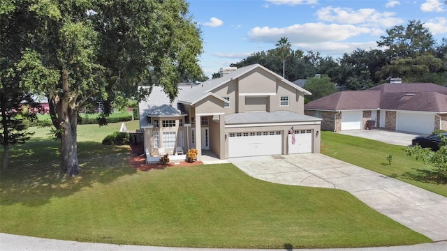 view of property with a garage and a front yard