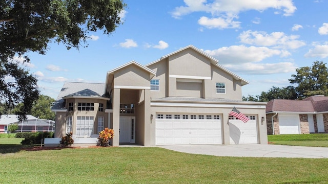 view of front facade featuring a garage and a front lawn