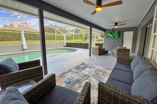 interior space featuring an outdoor hangout area, a fenced in pool, and glass enclosure