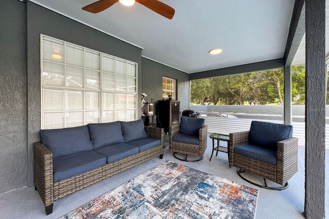 living room featuring ceiling fan