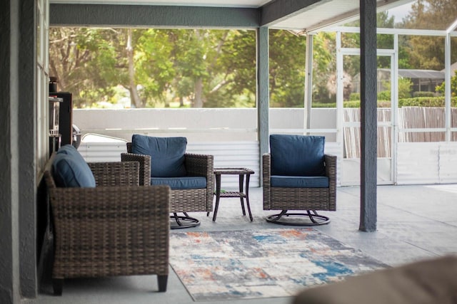 sunroom / solarium featuring plenty of natural light