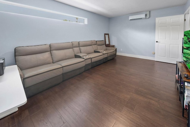 living room featuring an AC wall unit and dark hardwood / wood-style floors