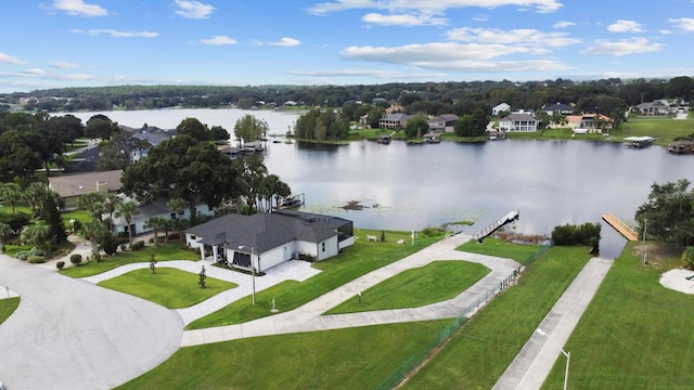 drone / aerial view with a water view