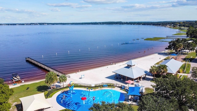 aerial view featuring a beach view and a water view