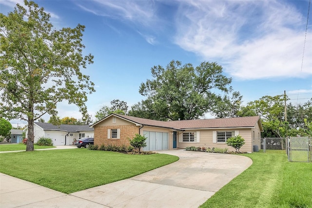 single story home featuring a front yard and a garage