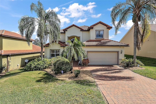 212 Crestrun Loop, Leesburg, FL 34748 - mediterranean / spanish house featuring decorative driveway, stucco siding, a tiled roof, a front lawn, and an attached garage