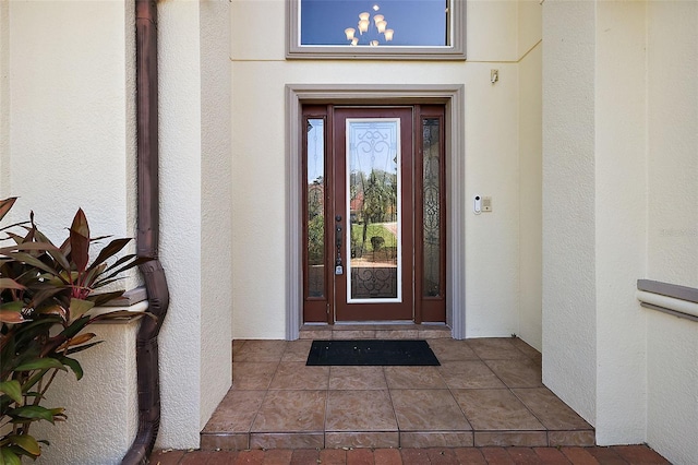 212 Crestrun Loop, Leesburg, FL 34748 - entrance to property featuring stucco siding